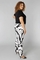 COLLETTA broek zwart wit travel prin
